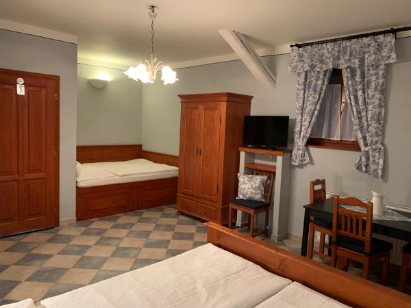 Pension Amadeus & Apartments : photo 4 de la chambre suite familiale (2 adultes + 2 enfants)