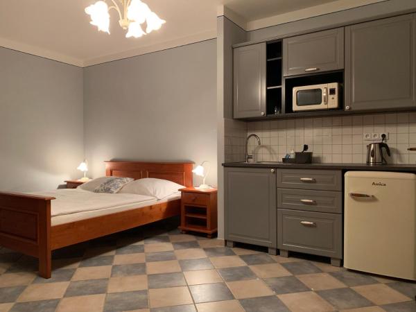 Pension Amadeus & Apartments : photo 3 de la chambre suite familiale (2 adultes + 2 enfants)