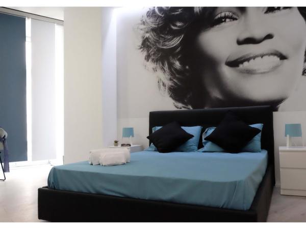 B&B Elmi : photo 2 de la chambre chambre deluxe (2 adultes + 1 enfant)