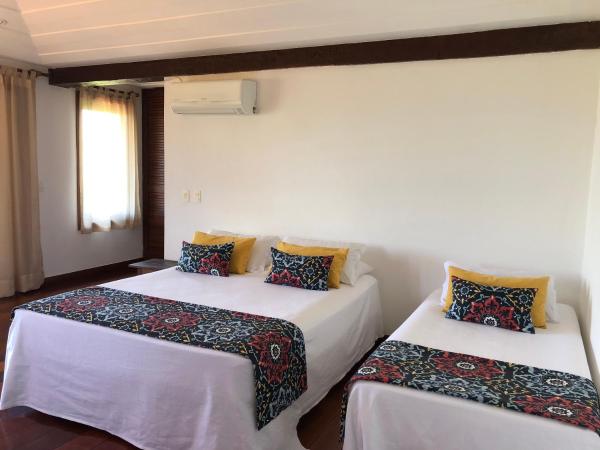 Pousada Encanto de Búzios : photo 6 de la chambre suite deluxe - vue sur mer