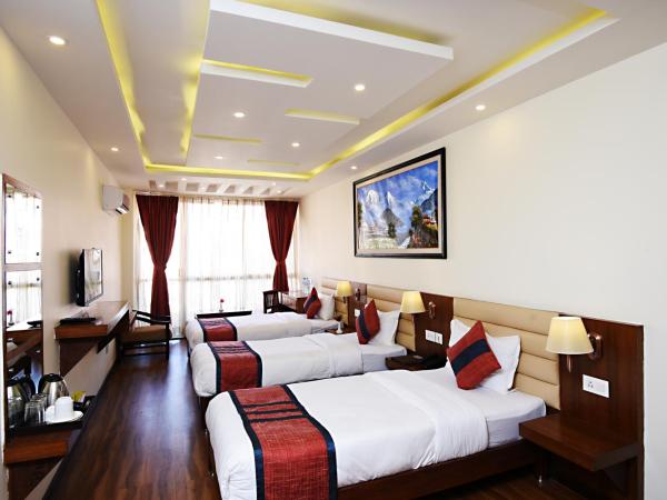 Hotel Jampa : photo 2 de la chambre chambre triple deluxe - navette aéroport aller ou retour gratuite