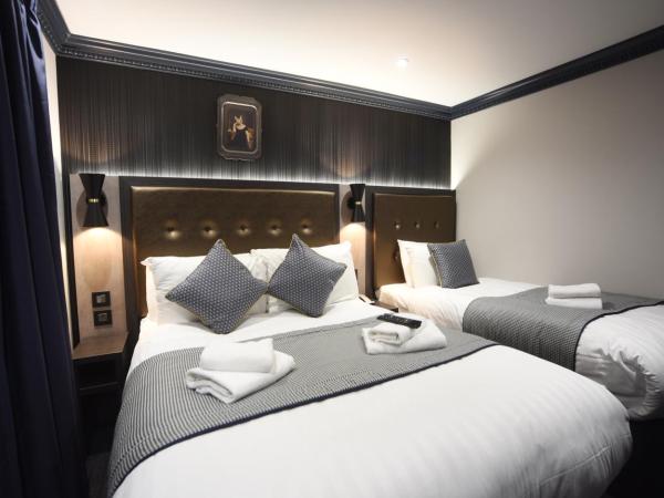 The House of Toby : photo 1 de la chambre chambre triple deluxe