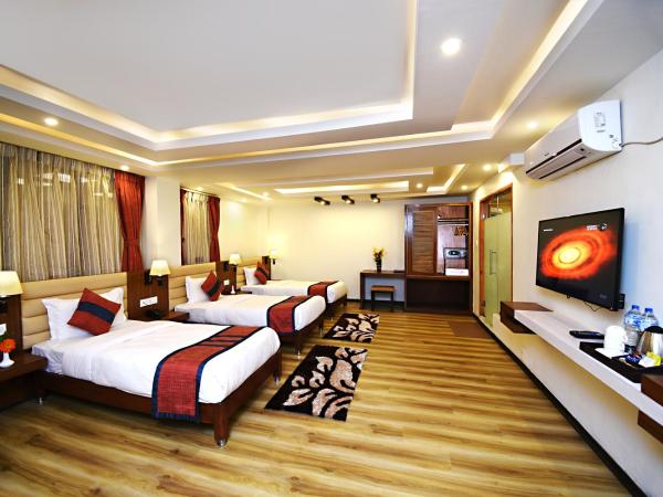 Hotel Jampa : photo 1 de la chambre chambre triple deluxe - navette aéroport aller ou retour gratuite