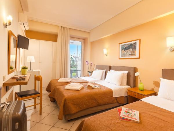 Minavra Hotel : photo 1 de la chambre chambre triple