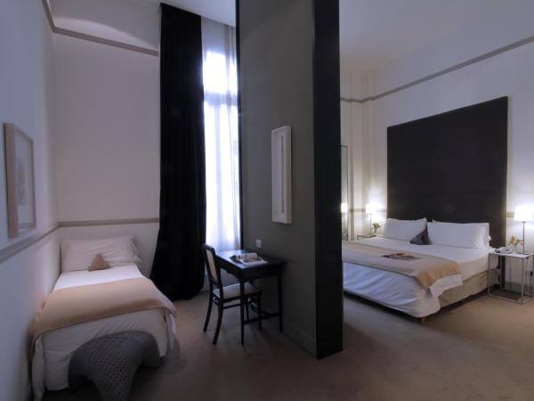 Esplendor by Wyndham Savoy Rosario : photo 2 de la chambre concept superior triple room with three twin beds