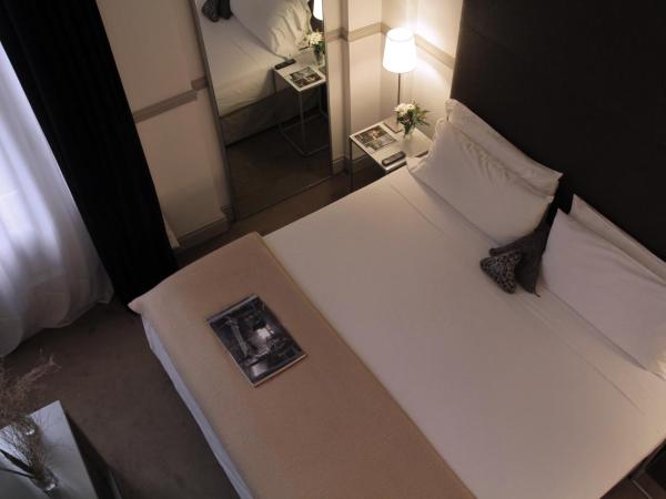 Esplendor by Wyndham Savoy Rosario : photo 6 de la chambre concept superior triple room with three twin beds