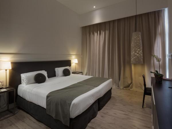 Esplendor by Wyndham Savoy Rosario : photo 4 de la chambre chambre lit queen-size accessible aux personnes à mobilité réduite - non-fumeurs