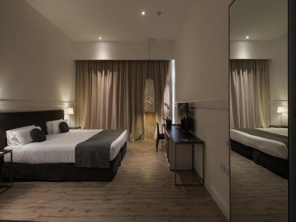 Esplendor by Wyndham Savoy Rosario : photo 6 de la chambre chambre standard lit queen-size