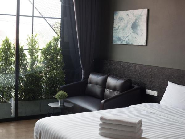 The Arbern Hotel x Bistro - SHA Extra Plus : photo 5 de la chambre chambre deluxe double ou lits jumeaux