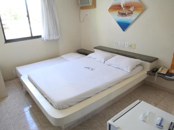 Hotel Piramide Pituba - Av Paulo VI : photo 1 de la chambre chambre triple de luxe