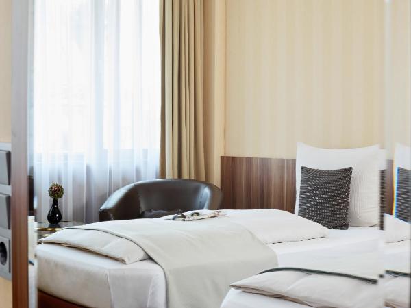 Living Hotel Düsseldorf : photo 4 de la chambre chambre double ou lits jumeaux business plus