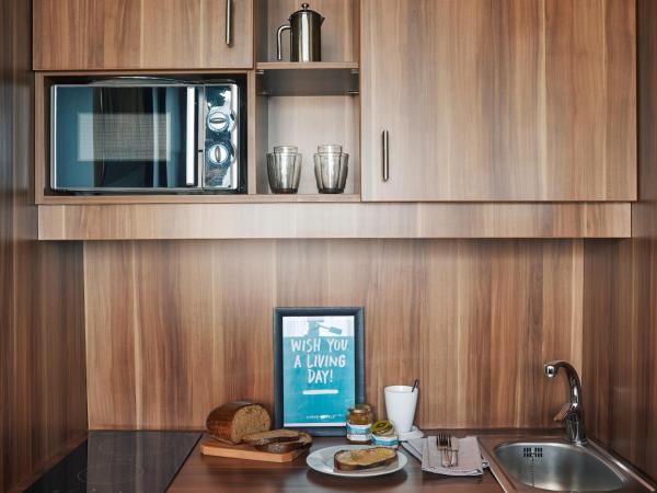 Living Hotel Düsseldorf : photo 6 de la chambre appartement double/lits jumeaux affaires plus - long séjour