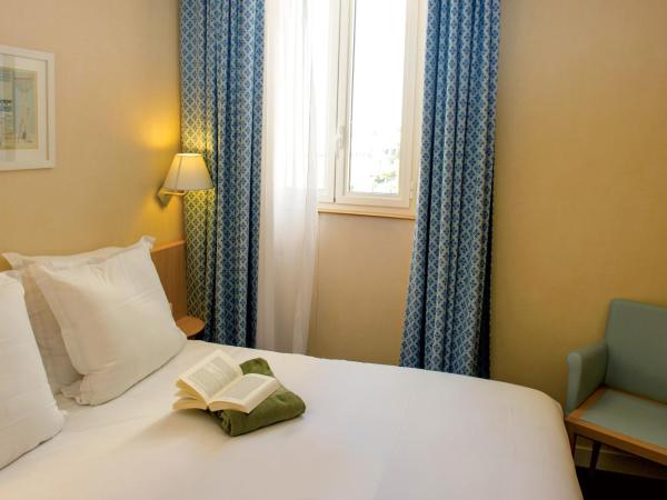 Hôtel Vacances Bleues Villa Caroline : photo 4 de la chambre chambre double côté parc