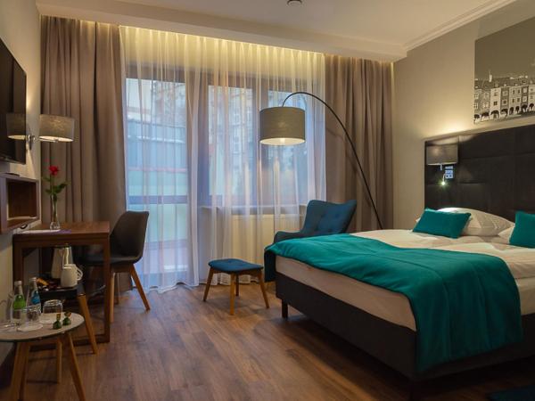Hotel Topaz Poznań Centrum : photo 2 de la chambre chambre double deluxe avec terrasse