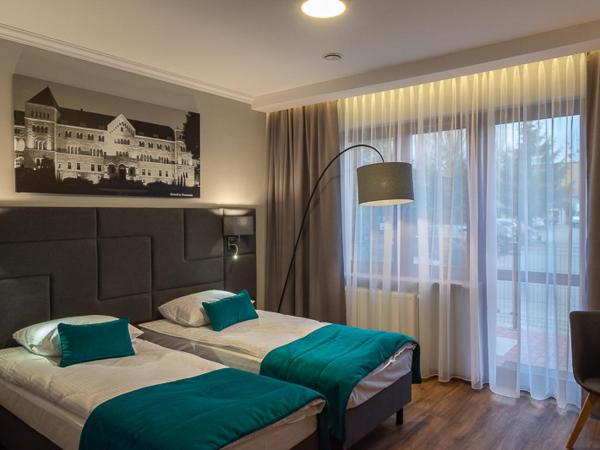 Hotel Topaz Poznań Centrum : photo 2 de la chambre chambre double deluxe avec terrasse