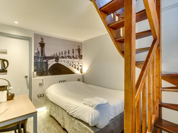 Kyriad Paris 12 - Nation : photo 4 de la chambre chambre quadruple standard