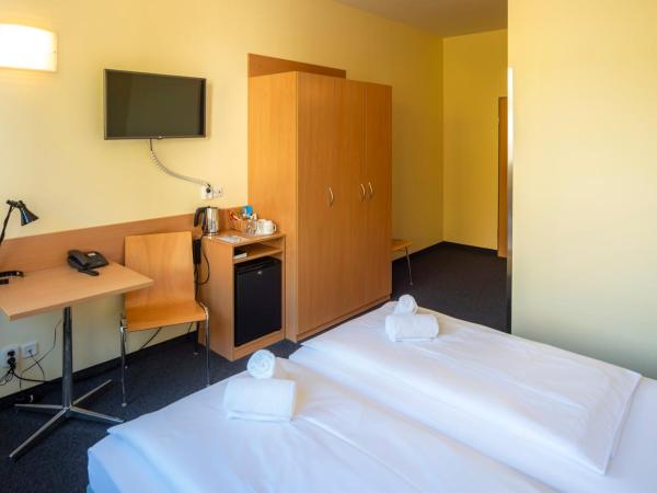 Familienhotel Citylight : photo 2 de la chambre chambre simple confort