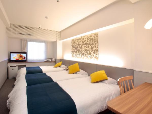 Hotel Plaza Osaka : photo 1 de la chambre chambre lits jumeaux avec lit d'appoint - non-fumeurs