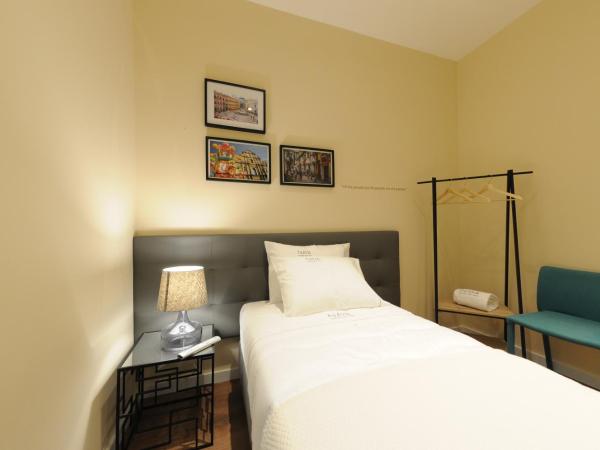 Naya-Downtown Guesthouse : photo 2 de la chambre chambre simple avec salle de bains privative