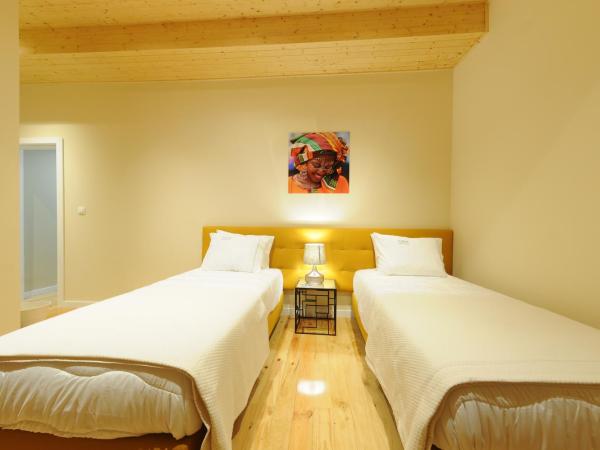 Naya-Downtown Guesthouse : photo 8 de la chambre chambre lits jumeaux