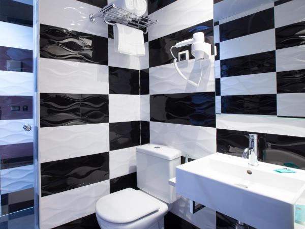 Jc Rooms Jardines : photo 8 de la chambre chambre deluxe double ou lits jumeaux