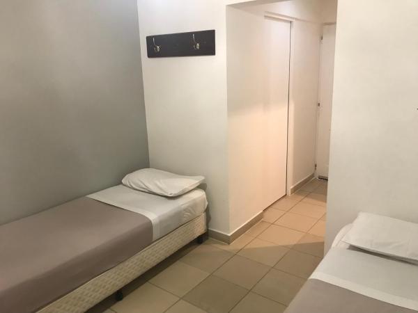 Folk Suites : photo 7 de la chambre petite chambre lits jumeaux