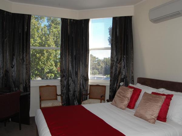 At Eden Park Motel : photo 1 de la chambre studio lit queen-size 