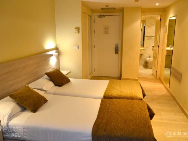 Hotel Alda San Carlos : photo 10 de la chambre chambre double ou lits jumeaux