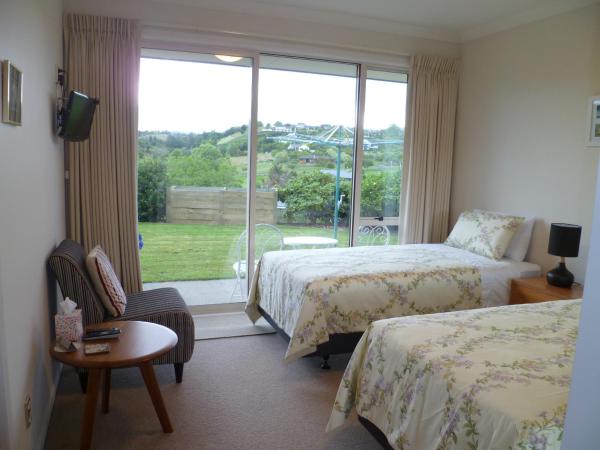 Bellarosa B&B : photo 1 de la chambre chambre lit king-size ou lits jumeaux deluxe - vue sur jardin