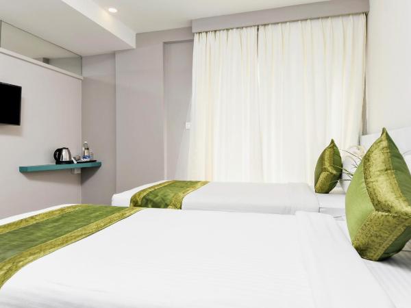 Treebo Stay Tuned JP Nagar : photo 6 de la chambre [sanitized] deluxe double or twin room