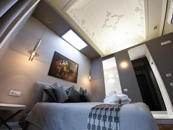 Leone Camere D'autore : photo 2 de la chambre suite avec baignoire spa