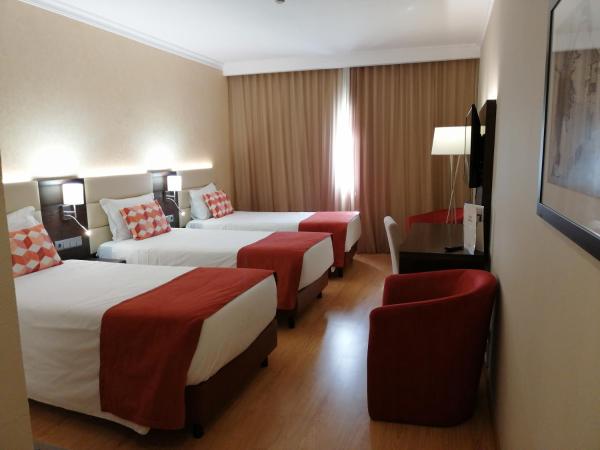 Hotel Monaco : photo 1 de la chambre chambre triple