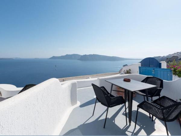 Strogili : photo 3 de la chambre studio troglodyte traditionnel (2-3 adultes) - annexe - vue sur caldera