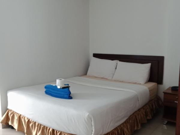 Baanpak Sam Anong : photo 2 de la chambre chambre lit queen-size avec balcon