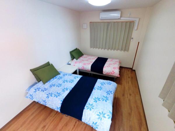 Mikawa House Osaka Castle : photo 1 de la chambre suite junior familiale