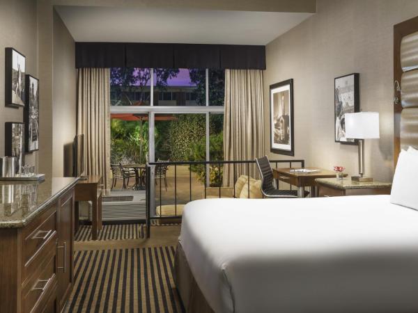 USC Hotel : photo 1 de la chambre chambre lit king-size - vue sur jardin