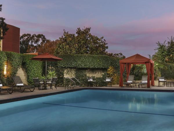 USC Hotel : photo 2 de la chambre chambre lit king-size - vue sur jardin