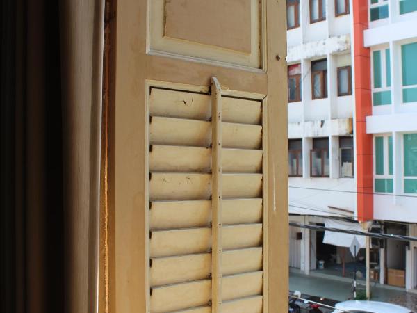 Old Penang Hotel - Trang Road : photo 2 de la chambre chambre simple avec salle de bains commune