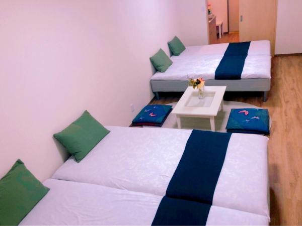 Mikawa House Osaka Castle : photo 1 de la chambre chambre familiale