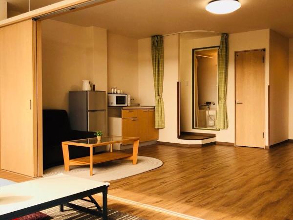 Mikawa House Osaka Castle : photo 1 de la chambre suite familiale