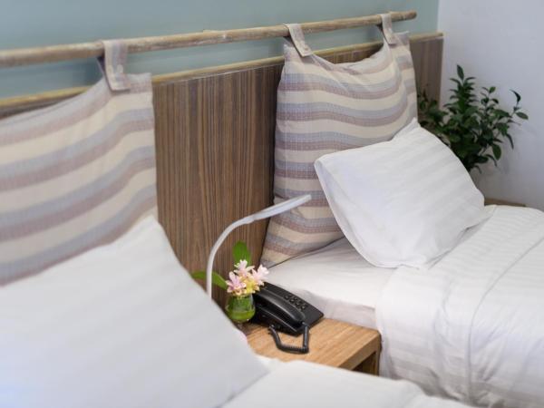 Pastell Oldtown Chiang Mai SHA Extra Plus : photo 3 de la chambre chambre lits jumeaux deluxe avec balcon