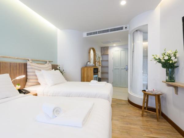 Pastell Oldtown Chiang Mai SHA Extra Plus : photo 1 de la chambre chambre lits jumeaux deluxe avec balcon