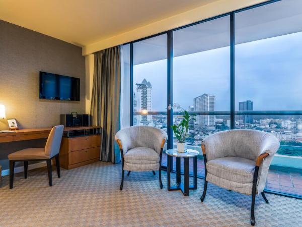 Résidence Chatrium Sathon Bangkok : photo 8 de la chambre grand studio lit king-size deluxe