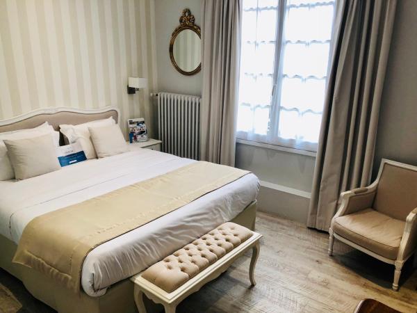 Kyriad Saumur Hyper Centre Hôtel Appartements et SPA soins Sothys Paris : photo 10 de la chambre chambre lits jumeaux supérieure