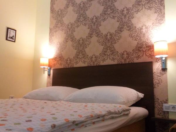 Borostyán Vendégház Eger : photo 5 de la chambre chambre triple avec salle de bains privative