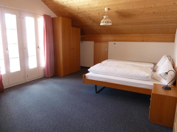 Berghaus Männlichen : photo 9 de la chambre chambre quadruple avec salle de bains privative