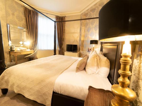 Brooks Guesthouse : photo 2 de la chambre chambre double avec lit à baldaquin king-size