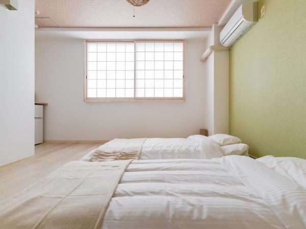 GuestHouse MIYABI : photo 1 de la chambre chambre double deluxe avec baignoire