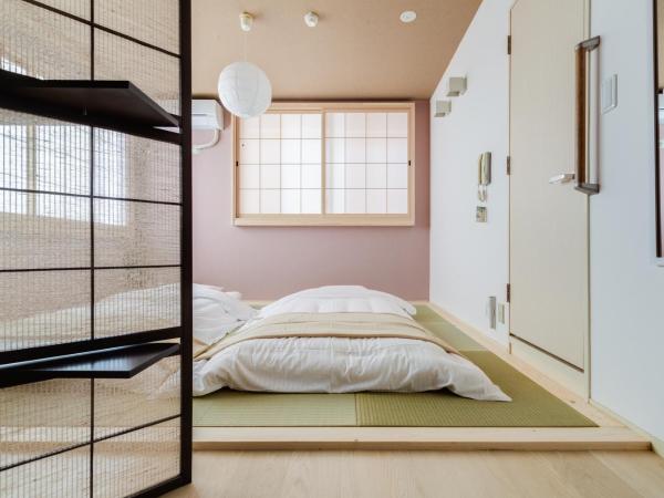 GuestHouse MIYABI : photo 5 de la chambre chambre quadruple avec salle de bains privative