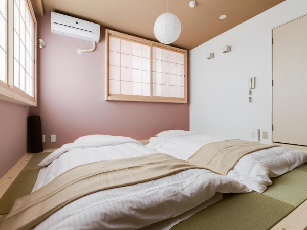 GuestHouse MIYABI : photo 6 de la chambre chambre quadruple avec salle de bains privative